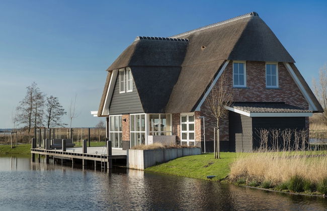 Friesland Villa With Fireplace - Photo 1