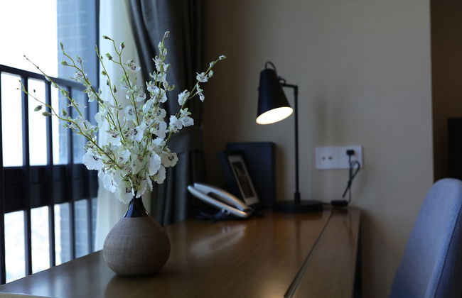 Yuwa Serviced ApartHotel - Photo 17