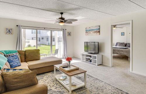 Coastal Condo Escape with Patio Steps to Beach - Photo 4