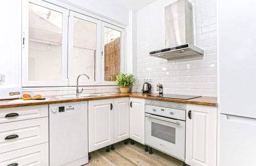 Precioso apartamento con Patio - Photo 13