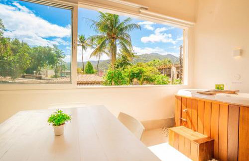 Casa d'Aroeira Residencial Boutique - Centro de Juqueí - Perto de Tudo - 2 quadras do Mar - Serviço de Praia - Roupa de Cama 600 fios algodão Egípcio - Tudo Novo - Estacionamento Interno - Cozinha - Consulte unidades com Ofurô Hidro e Cromoterapia - Foto 2