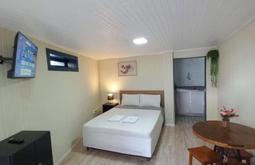 Suíte Aconchegante em Hospedaria no Centro - Photo 1