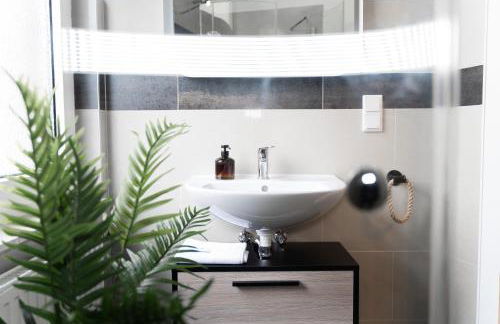 JUNIK Apartments - Deine Cityapartments in Duisburg - Photo 19