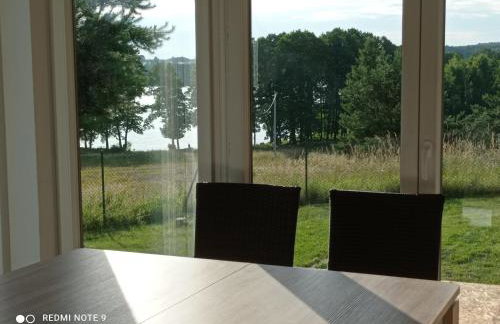 Dom z pięknymi widokami na jezioro ryńskie ilasy. - Foto 41