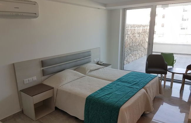 Melini Hotel Suites - Photo 5