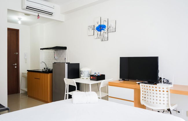 Homey Studio Signature Park Grande Apartment - Photo 1