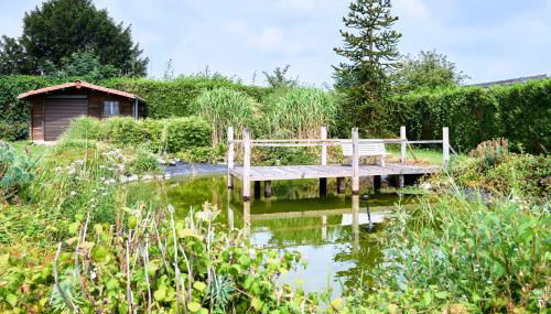 VILLA ARCADIA - Piscine - Spa - Sauna - Cinéma - Jeux d'arcades - Jeux vidéo - Bassin naturel - Jardin - Foto 3, Garden view