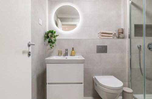 Boutique Soft Tones with Balcony and Secured Garage - Photo 3