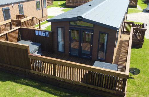 Honeysuckle Lodge - Foto 1