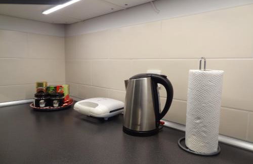 Well-equipped apartment with free parking - Photo 20