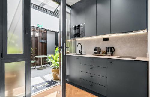 Pacifico Suites near Retiro - Photo 37