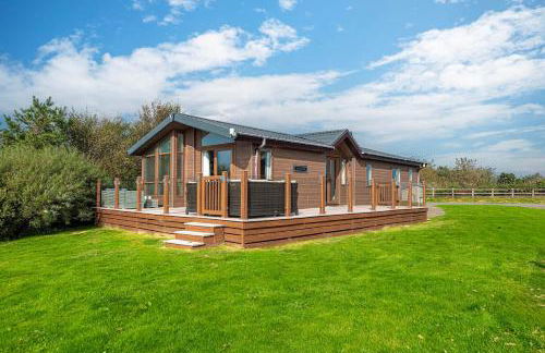 Stables 30, 3 Bed Luxury Lodge at Hafan y Mor - Foto 1