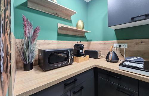 Alpha Apartments - Photo 9