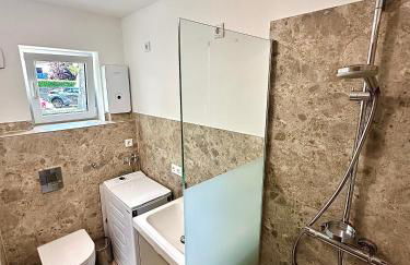 Stylisches See-Studio mit Badezugang & Garten - Photo 4