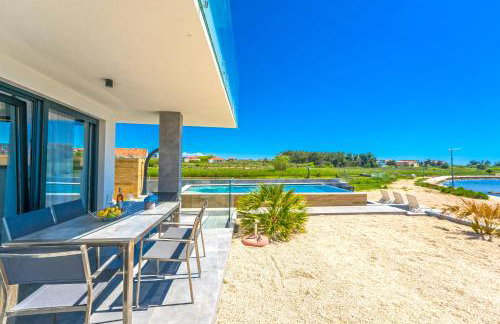 JamC Dream Familientraum direkt am Meer mit beheiztem Pool - Photo 30