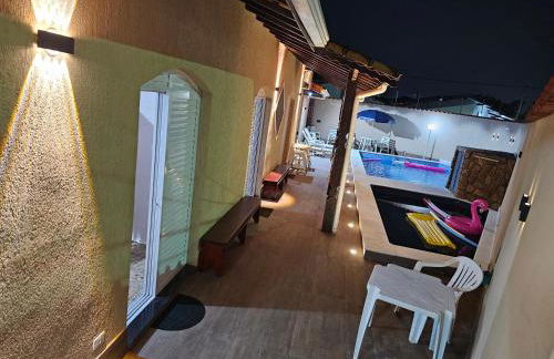 Casa Lindíssima e Espaçosa com 2 Piscinas - Adulto e Infantil, Perto da Praia, Opção da Piscina Adulto Aquecida Cobrado à Parte, 4 Quartos Frente as Piscinas, Área Gourmet Completa com Churrasqueira, Forno e Fogão a Lenha, Mesa de Bilhar, Lareira na Sala - Photo 8