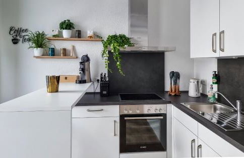 WiLUKA Penthouse mit großer Dachterasse -highspeed Wifi- 24Std Check-In -nachhaltig eingerichtet- Netflix - Photo 23