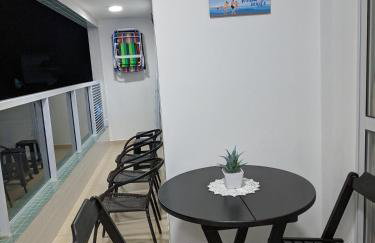 Apto completo com varanda gourmet a 50 mt da praia - Photo 1