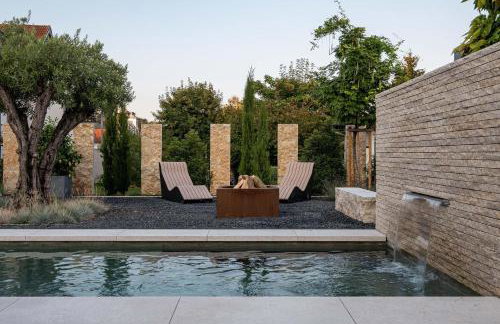 Domizil Relax - Heimathafen mit ruhiger Terrasse, Blick auf Wasserbecken und Garten - Photo 15