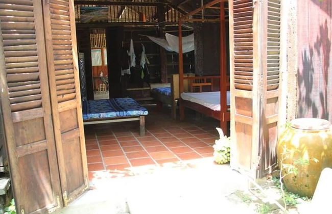 Peaceful Homestay in the Middle of Fruit Garden - Room With Four Double Beds - Foto 1