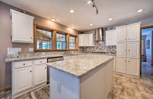 Spacious Lakefront Home with Sunroom and Bar! - Photo 11