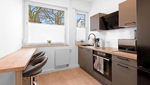 Lünen Living Apartments #10 - Foto 5, dishwasher