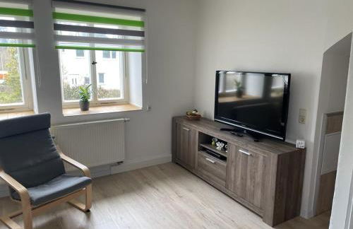 Monteur Ferienwohnungen OT Kleinwaltersdorf mit Außensitzecke und Grill - Foto 11