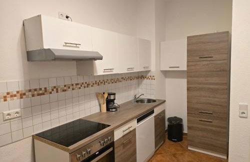 Boardinghouse mit 10 großen Apartments mit Parkplatz und Balkon - Photo 17