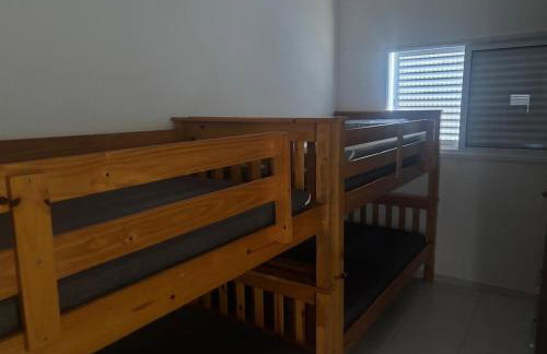 APTO FAMILIAR EM BERTIOGA JARDINS DO INDAIÁ A 500 M Praia - Foto 19