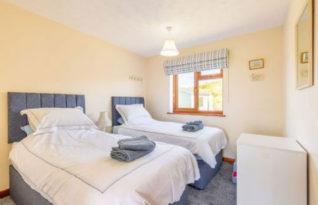 Host Stay Breezy Bungalow - Foto 6