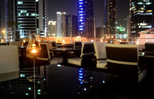 Magnum Hotel & Suites West Bay - Foto 39