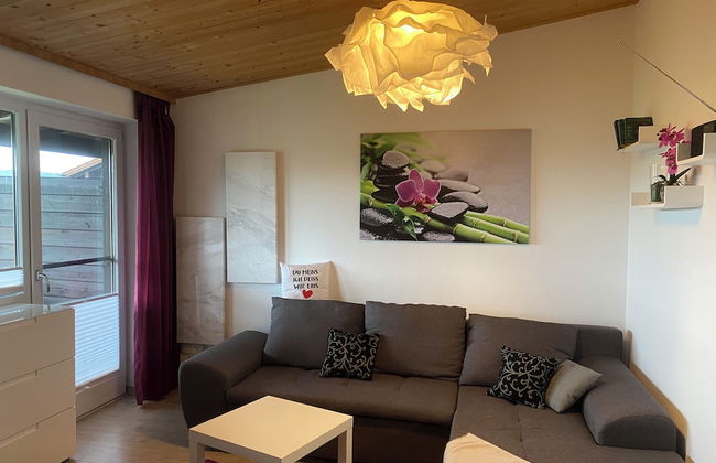 Stylish Apartment With Modern Amenities and Scenic Views - Photo 1