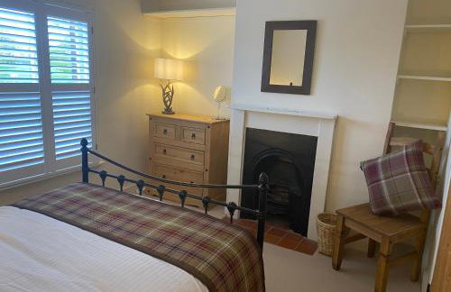 A charming and stylish country cottage. - Foto 24