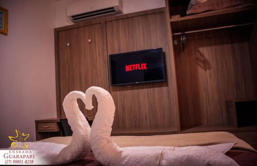 MAIOR NOTA - 2 Quartos com AR CONDICIONADOS SPLIT, Air Fryer, Wi-Fi, Disney Plus, Star Plus, HBO Max, Cadeiras de Praia, Caixa Térmica, Churrasqueira, Rede para Descanso e Chuveirão - 8 pessoas - CONFORTO Máximo - Melhor Localização!! - Photo 5