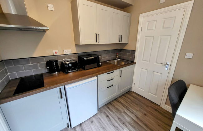 Comfortable Stay - LB Ave - Photo 17