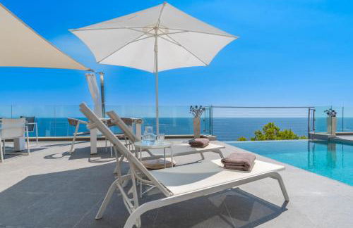 Can Ema, villa moderna con piscina frente al mar - Photo 44