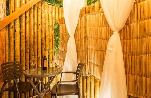 Casa d'Aroeira Residencial Boutique - Centro de Juqueí - Perto de Tudo - 2 quadras do Mar - Serviço de Praia - Roupa de Cama 600 fios algodão Egípcio - Tudo Novo - Estacionamento Interno - Cozinha - Consulte unidades com Ofurô Hidro e Cromoterapia - Foto 20