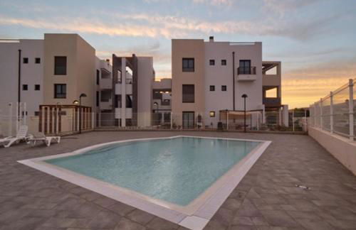 Sunny Luxury Apartment with two great sunny - level terraces, two swimming pools, in a new complex Pueblo Majorero, close to Fuerteventura Golf Club, next to the beach , Atlantico Shopping Mall and casino in Caleta de Fuste - Foto 49