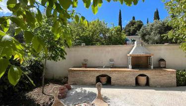 Verde Olive Three-Bedroom Holiday Home by Konnect - Foto 5, Garden