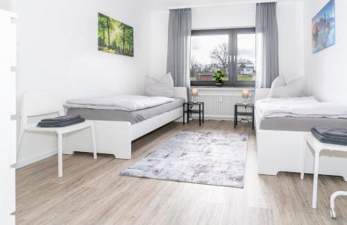 MR Living I moderne Apartments mit Einzelbetten, voll ausgestattete Küche, WLAN, Parkplatz I DR01, DR02 - Foto 1