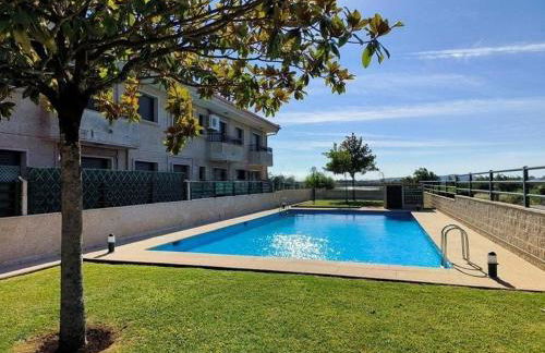 Apartamento con piscina en Playa de A Lanzada - Foto 1