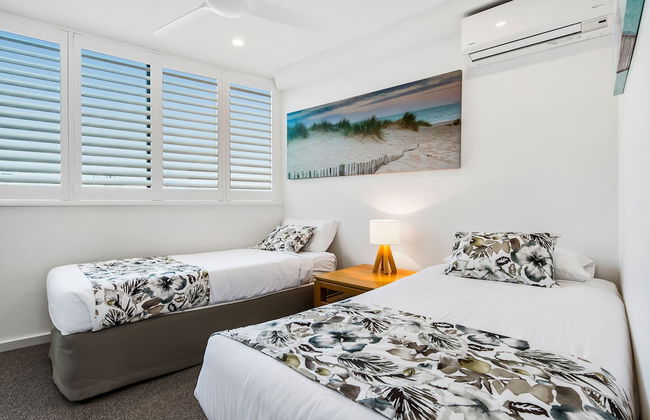 Peninsular Beachfront Resort - Photo 15