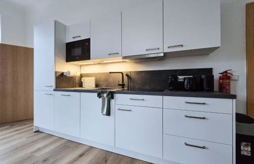 Alpha Apartments - Photo 46