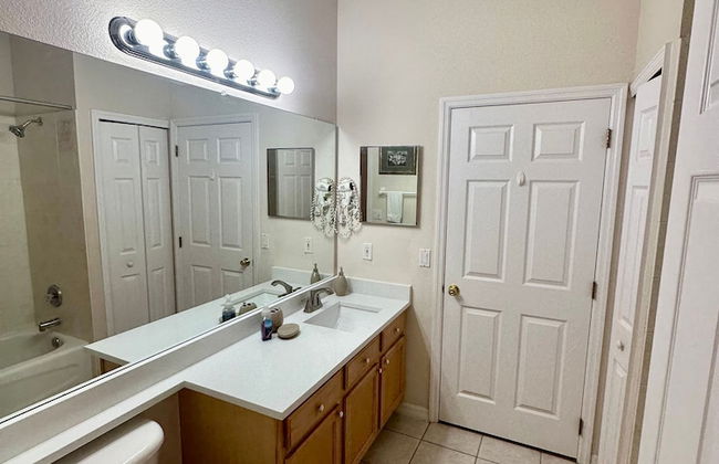 Grand Fabulous 4BR Pool Home Near Disney - Photo 24