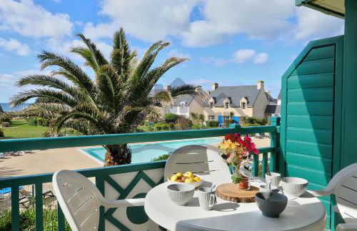 LocaLise - A18 - Appartement avec balcon - Petite vue mer à travers le palmier - Piscine de avril à septembre - Wifi inclus - Animaux admis - Draps inclus - Parking inclus - Foto 1