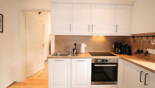 Stilvoll eingerichtete Landhauswohnung - Foto 4