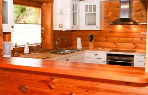 Holzhaus Hubertus mit Sauna und Kamin - Foto 38