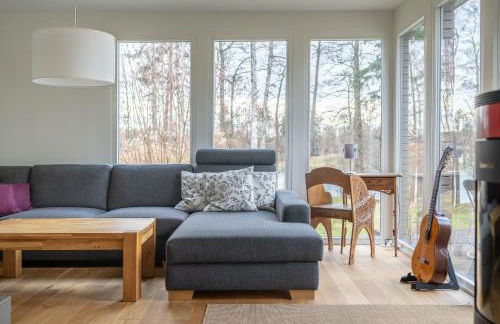 Ferienhaus direkt am See - Kamin, Klima, Sauna und Boot - Foto 3