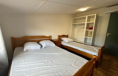 Domaine de vacances à 600m de la plage villa climatisée 3 chambres 7 couchages terrasse WIFI animations et piscines en supplément LRPDSD7 - Foto 10