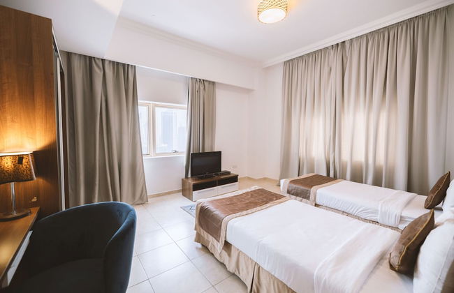 Magnum Hotel & Suites West Bay - Foto 11